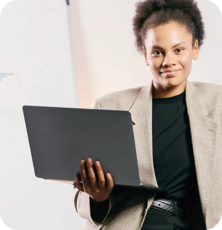 Designer reviewing work on a laptop
