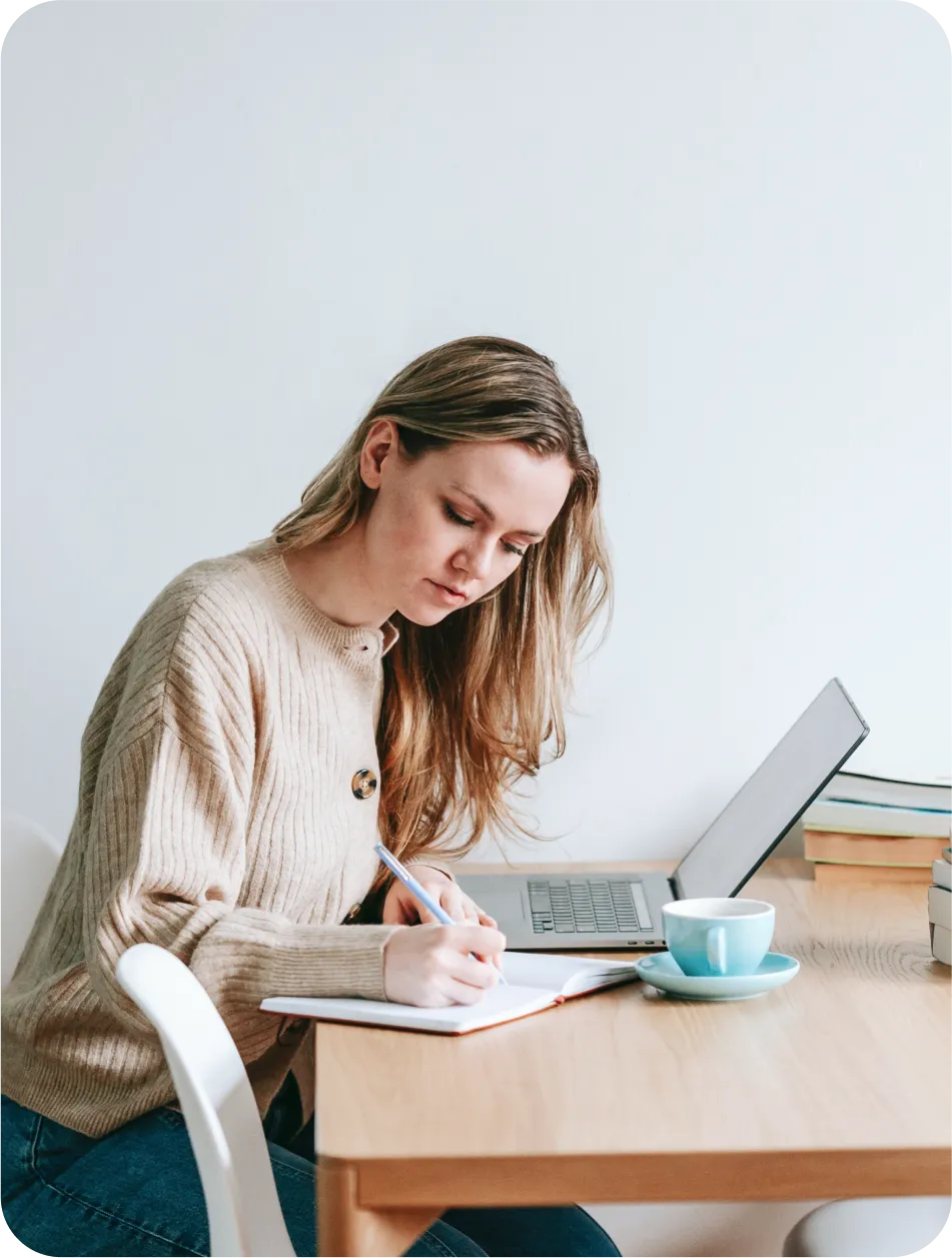 Designer sketching a layout at her desk