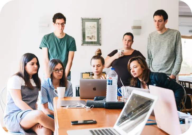 Designers reviewing printed work